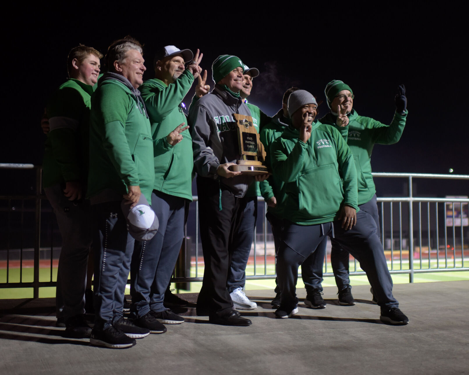 The Blair Oaks coaching team poses for a celebratory photo